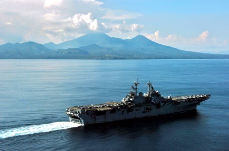 US Navy 061104-N-5067K-143 USS Essex (LHD 2) passes Mt. Bulusan a volcano located on the southern end of the Island of Luzon as it transits through the San Bernardino Straits