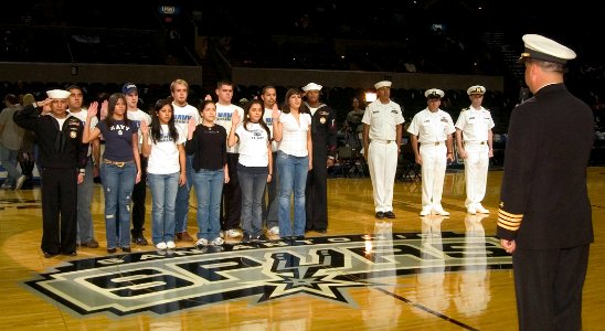 US Navy 061103-N-3750S-080 Delayed Entry Program (DEP) participants and Sailors from the Navy Recruiting Station, Killeen Texas (NRS), enlist and reenlist in the Navy by Capt. Ronald Sandoval