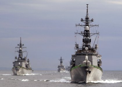 US Navy 061027-N-4649C-074 The Japanese anti-submarine warfare destroyer Onami (DD 111), leads a flotilla of ships from the Japan Maritime Self-Defense Force during a fleet review practice photo