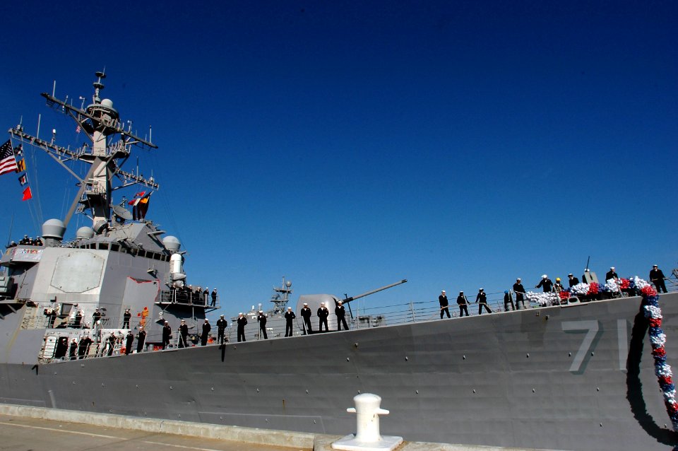 US Navy 061106-N-4515N-092 Sailors man the rails as the guided-missile destroyer USS Ross (DDG 71) returns to her homeport of Naval Station Norfolk