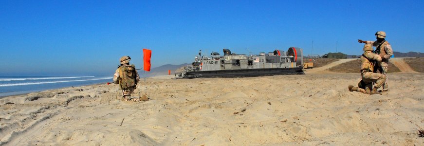 US Navy 061021-N-4774B-260 Sailors assigned to Beach Masters Unit One (BMU-1) participate in training exercises designed to simulate real world scenarios photo