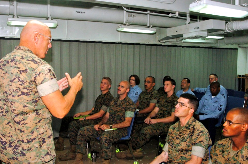 US Navy 061104-N-5067K-002 Sgt. Maj. James R. McKay assigned to the 31st Marine Expeditionary Unit (MEU) briefs a Marine Staff Sergeant's Indoctrination Course