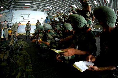 US Navy 061026-N-0209M-005 Indian soldiers assigned to the 9th Battalion of the Sikh Infantry take notes during small arms training aboard USS Boxer (LHD 4) during Malabar 2006