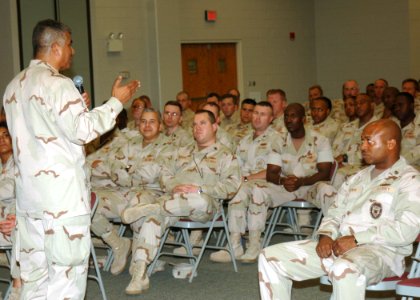 US Navy 061023-N-8623S-004 Master Chief Petty Officer of the Navy (MCPON) Joe R. Campa Jr. conducts an all hands call with chief petty officers attached to Naval Support Activity (NSA) Bahrain