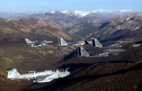 US Navy 061101-F-6911G-014 A five-plane formation pass over the Sawtooth Mountains
