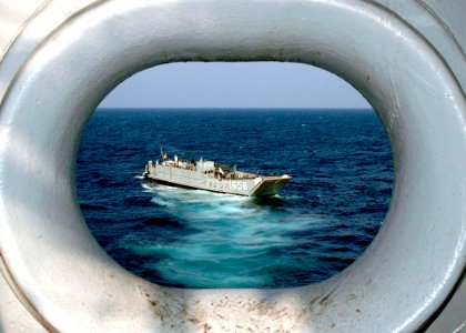 US Navy 061030-N-8547M-036 Landing Craft Utility 1658 underway in Persian Gulf performing small boat operations moments after departing the well deck of amphibious assault ship USS Saipan (LHA 2)