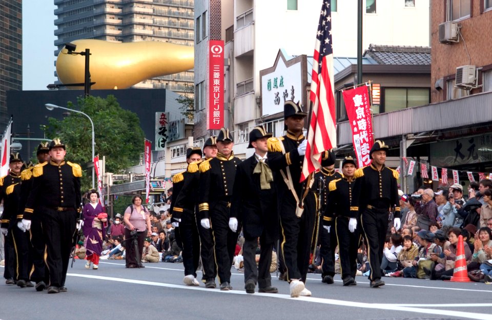 US Navy 061103-N-9851B-005 Thirteen Commander Fleet Activities Yokosuka Sailors, dressed as Commodore Matthew C. Perry and crew, march through the Asakusa district of Tokyo, during the Tokyo Jidai Parade