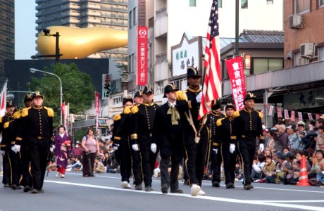 US Navy 061103-N-9851B-005 Thirteen Commander Fleet Activities Yokosuka Sailors, dressed as Commodore Matthew C. Perry and crew, march through the Asakusa district of Tokyo, during the Tokyo Jidai Parade