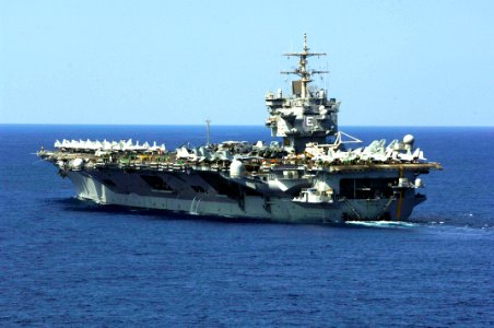 US Navy 061031-N-5330L-081 The nuclear-powered aircraft carrier USS Enterprise (CVN 65) as seen from the Nimitz-class aircraft carrier USS Dwight D. Eisenhower (CVN 69) as Eisenhower pulls alongside Enterprise for turnover