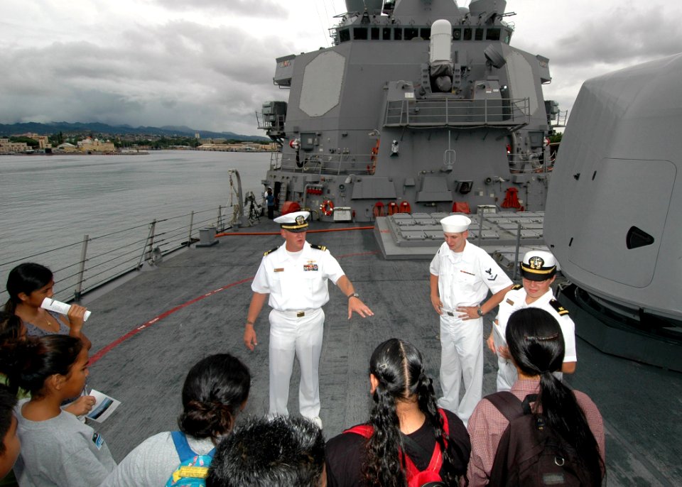 US Navy 061101-N-0879R-002 From the bow of the Pearl Harbor-based guided missile destroyer USS Hopper (DDG 70), students from Aiea High School learn about the ship and the Navy's mission