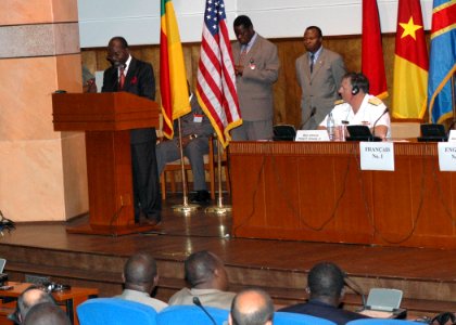 US Navy 061113-N-2893B-003 M. Alexandre K. Dossou, Benin's Minister of Transportation, Public Works and Town Planning, delivers welcoming remarks in French at the Maritime Safety and Security at the Gulf of Guinea Ministe photo