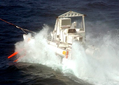 US Navy 061107-N-8547M-039 An MK-105 mine countermeasure sled crashes through the waves while being towed