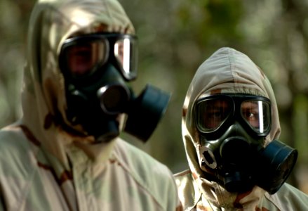 US Navy 061031-N-9769P-413 Students in the chemical, biological and radiological phase of training at the Naval Explosive Ordnance Disposal School don full protective gear and are taught to maneuver around hazardous material wi