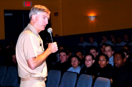 US Navy 061102-N-3241S-087 Commander, U.S. Naval Forces, Japan Rear Adm. James D. Kelly briefs his area of responsibility to both staff and students at Ross Theater who were interested in getting stationed in Japan