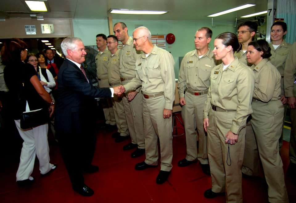 US Navy 071006-F-6655M-092 Secretary of Defense Robert M. Gates greets crew members and receives a tour of the facilities aboard the Military Sealift Command (MSC) hospital ship USNS Comfort