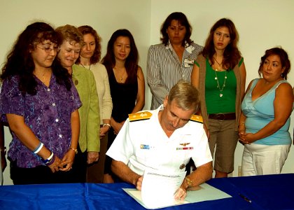 US Navy 071003-N-0995C-001 Rear Adm. T.G. Alexander, commander of Navy Region Hawaii and Naval Surface Group Middle Pacific, signs a domestic violence proclamation at the Fleet Family Support Center supporting the movement agai
