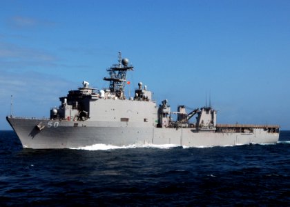 US Navy 071007-N-4014G-055 Dock landing ship USS Carter Hall (LSD 50) approaches Military Sealift Command fleet replenishment oiler USNS Tippecanoe (T-AO 199) for an underway replenishment
