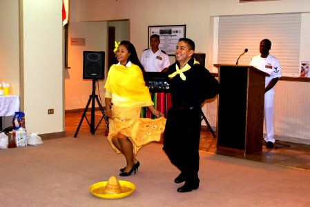 US Navy 071010-N-3202N-002 Hospital Corpsman 2nd Class Alejandro Alcala and Mrs. Elizabeth Taylor performs the Mexican Hat Dance in celebration of the Hispanic Heritage Month at U.S. Naval Hospital Sigonella