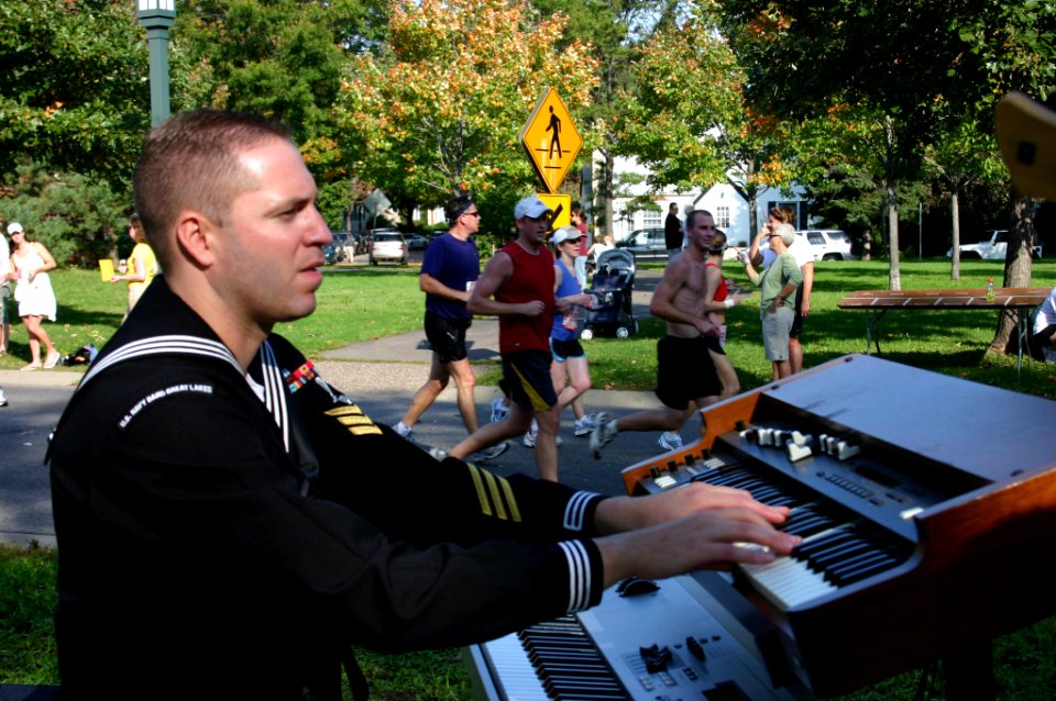 US Navy 071007-N-7163S-004 Musician 1st Class Steve Kendell assigned to Navy Band Great Lakes Horizon entertains passing runners at the 15 mile marker of the Twin Cities Marathon