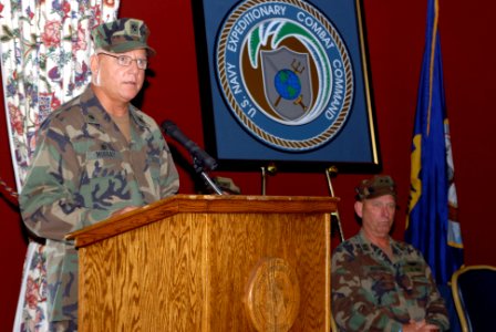 US Navy 071004-N-8907D-044 Cmdr. Michael R. Murray, commanding officer of Navy Expeditionary Intelligence Command (NEIC), speaks during the command's establishment ceremony at Naval Amphibious Base Little Creek photo