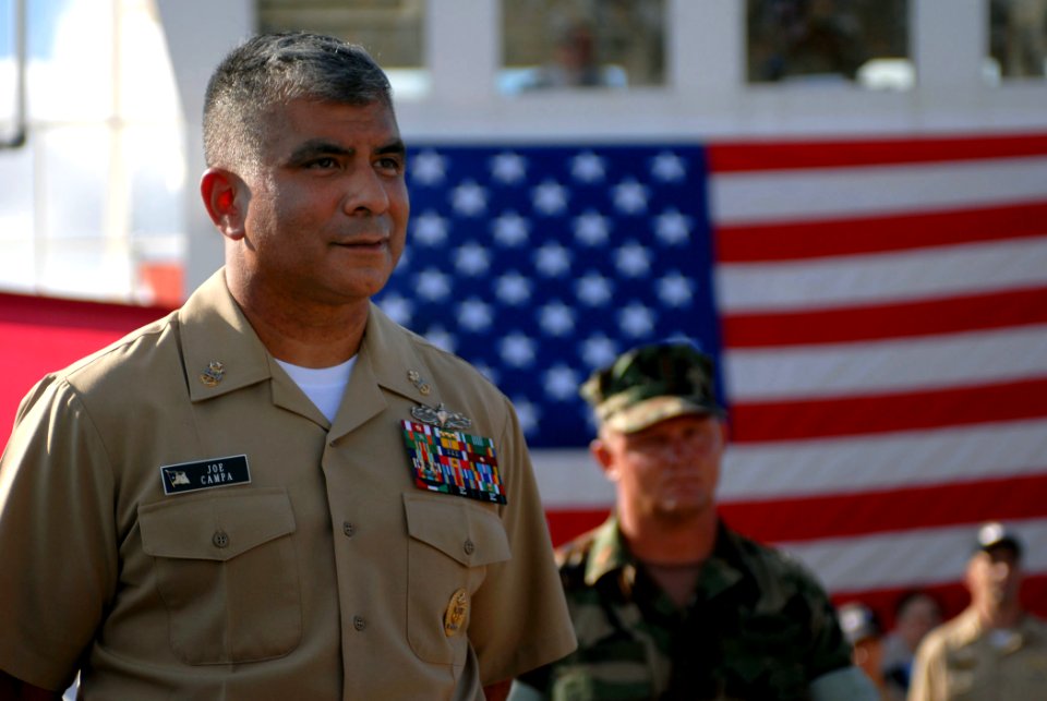 US Navy 071012-N-4238B-258 Master Chief Petty Officer of the Navy (MCPON) Joe Campa prepares to address the crew of the hospital ship USNS Comfort (T-AH 20) while off the coast of Miami Oct. 12