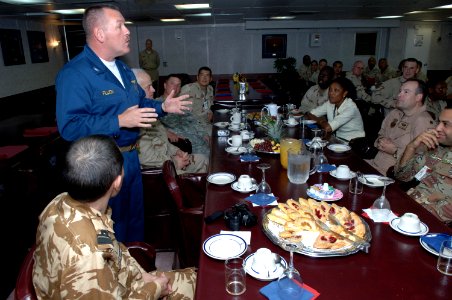 US Navy 071010-N-3931M-057 Capt. Daniel Fillion, executive officer of USS Wasp (LHD 1), talks to personnel from Combined Joint Task Force-Horn of Africa (CJTF-HOA) during their tour of the multipurpose amphibious assault ship