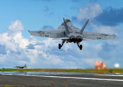 US Navy 071016-N-5253W-004 An FA-18-F Super Hornet assigned to the Diamondbacks of Strike Fighter Squadron (VFA) 102, performs touch and go flight operations on the island of Iwo To, formerly known as Iwo Jima