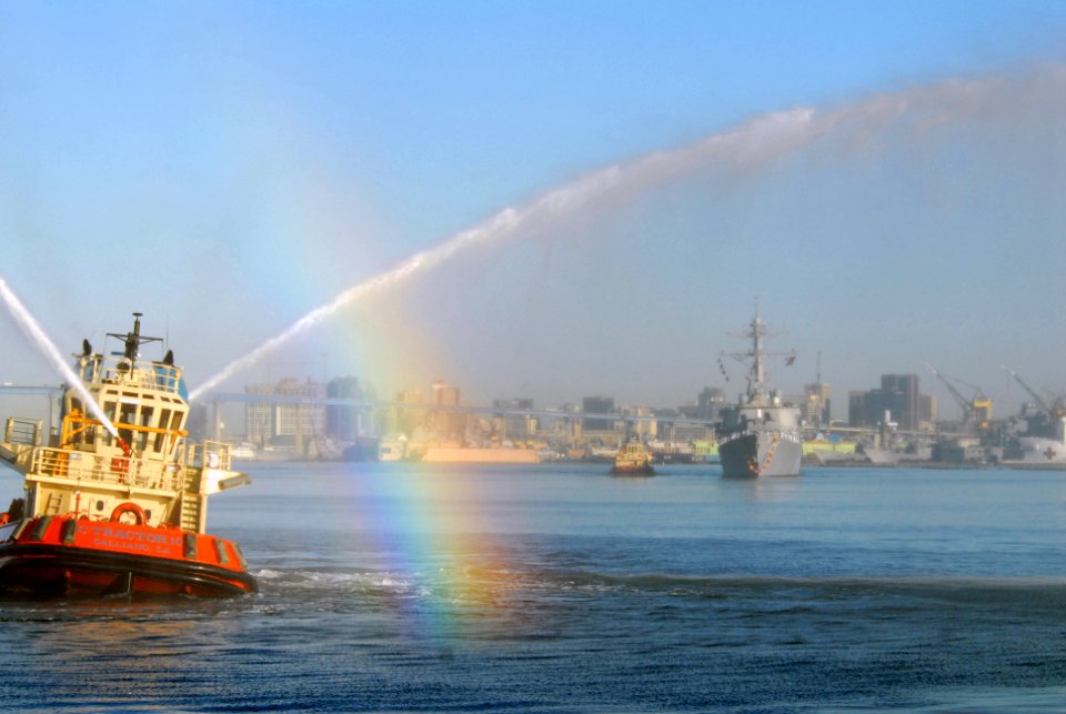 US Navy 071008-N-9909C-002 Tug boat Tractor 10 gives guided-missile destroyer USS Milius (DDG 69) a water cannon welcome as the ship returns to her homeport of San Diego