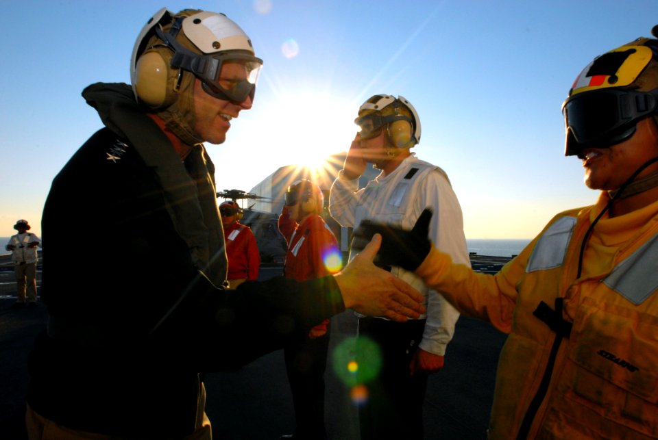 US Navy 071015-N-8704K-092 Adm. Jonathan Greenert, commander of Fleet Forces Command, shakes hands with Sailors aboard the Military Sealift Command hospital ship USNS Comfort (T-AH 20)