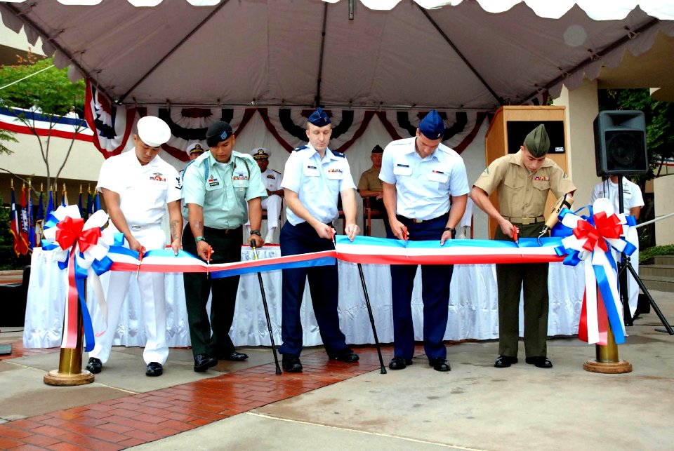 US Navy 071015-N-5086M-049 Military members cut a ribbon signifying the Comprehensive Combat and Complex Casualty Care (C5) Grand Opening at Naval Medical Center San Diego
