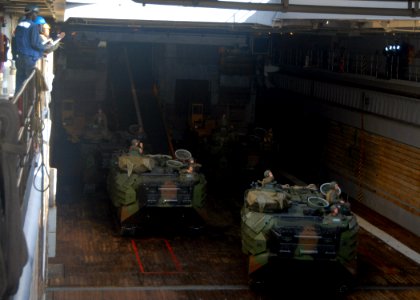 US Navy 071010-N-6710M-018 A landing craft utility exits the well deck of dock landing ship USS Tortuga (LSD 46) while transiting equipment