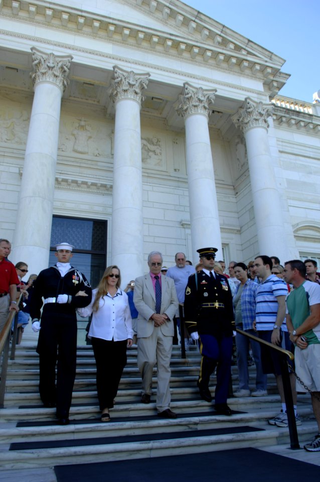 US Navy 071021-N-2653P-310 Daniel and Maureen Murphy, the parents of Navy SEAL Lt. Michael Murphy, walk down the steps at the Tomb of the Unknowns at Arlington National Cemetery