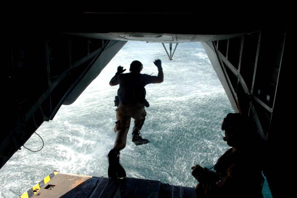 US Navy 071016-N-3931M-077 Servicemembers assigned to Explosive Ordnance Disposal Mobile Unit (EODMU) 8 and U.S. Air Force 82nd Pararescue Unit perform water rescue techniques during a routine training exercise off the coast of