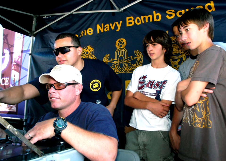US Navy 071016-N-5208T-014 Members of Explosive Ordinance Disposal Unit (EODU) 2, show off the control panel of the Talon robot