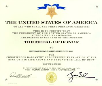 US Navy 071022-N-0000X-002 Navy file photo of the Medal of Honor certificate presented by President George W. Bush to Daniel and Maureen Murphy, the parents of Navy SEAL Lt. Michael Murphy