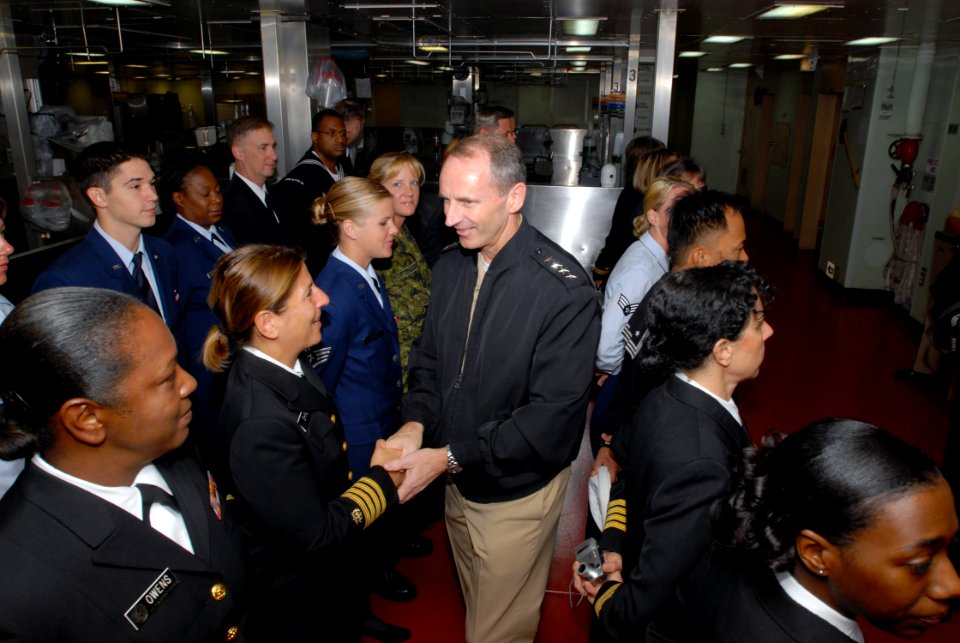 US Navy 071015-N-8704K-039 Adm. Jonathan Greenert, commander of Fleet Forces Command, shakes hands with crewmembers aboard the Military Sealift Command hospital ship USNS Comfort (T-AH 20)