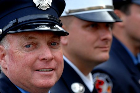 US Navy 071023-N-2653P-258 A New York City firefighter representing Engine 53, Ladder 43, attends the Medal of Honor Flag ceremony recognizing the actions of Navy SEAL Lt. Michael Murphy held at the United States Navy Memorial