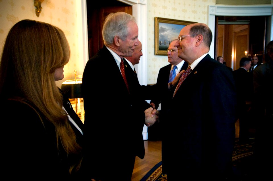 US Navy 071022-N-5319A-018 Secretary of the Navy (SECNAV), the Honorable Dr. Donald C. Winter meets with Daniel and Maureen Murphy, the parents of Navy SEAL Lt. Michael Murphy, prior to the Medal of Honor ceremony at the White