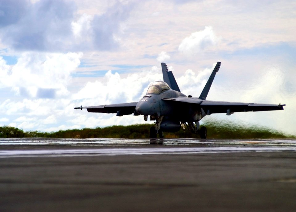 US Navy 071016-N-5253W-001 An FA-18-F Super Hornet assigned to the Diamondbacks of Strike Fighter Squadron (VFA) 102, prepares to launch from the runway on the island of Iwo To, formerly known as Iwo Jima