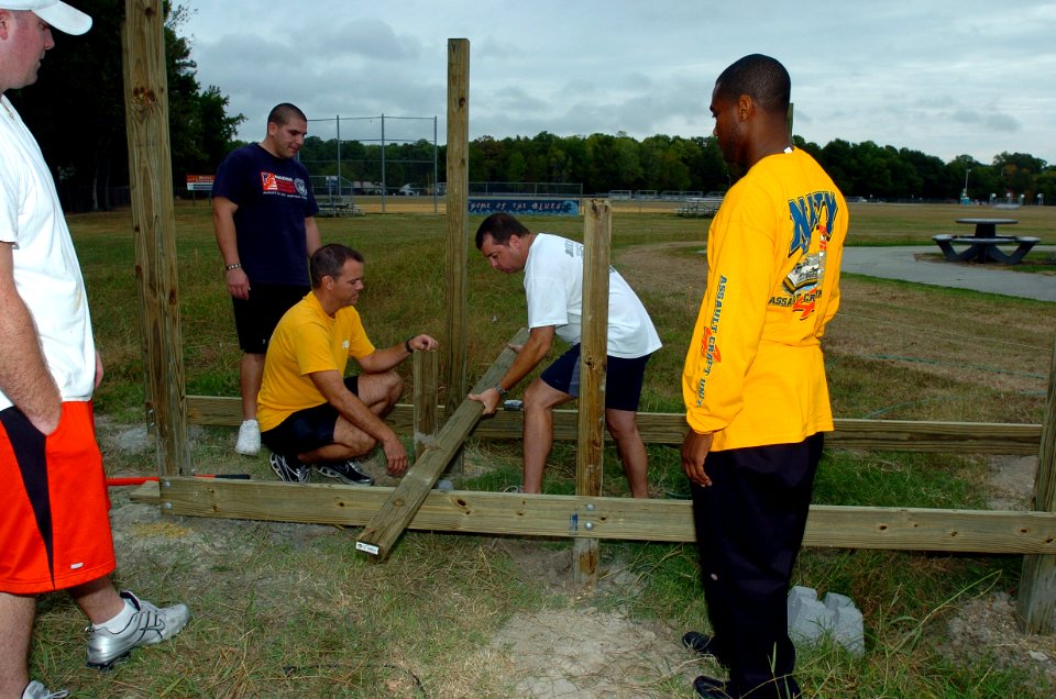 US Navy 071019-N-1082Z-016 Sailors attached to Assault Craft Unit (ACU) 4 help build a bridge at Lynnhaven Middle School in support of Partnership for Education