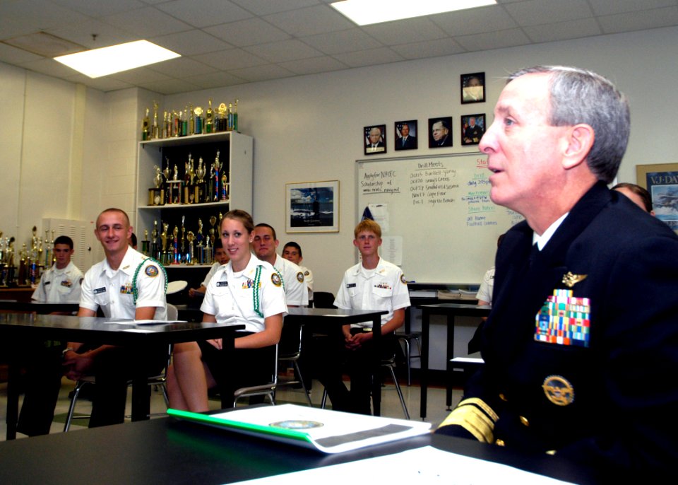 US Navy 071016-N-5208T-001 Rear Adm. Gary Jones, commander of Naval Education and Training Command, discusses training opportunities with Cary High School Navy Junior Reserve Officers' Training Corps cadets