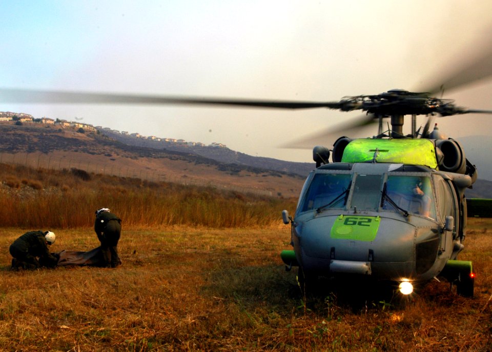 US Navy 071023-N-3069F-023 Chief Aviation Electronics Technician Rexford Sackett, left, and Aviation Warfare Systems Operator 3rd Class William Quadrino, assigned to Helicopter Sea Combat Squadron (HSC) 85, prepare to assemble