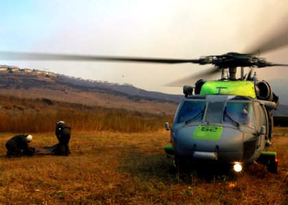 US Navy 071023-N-3069F-023 Chief Aviation Electronics Technician Rexford Sackett, left, and Aviation Warfare Systems Operator 3rd Class William Quadrino, assigned to Helicopter Sea Combat Squadron (HSC) 85, prepare to assemble