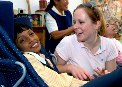 US Navy 071016-N-6524M-002 Hospital Corpsman 2nd Class Rita Rombaoa participates in a community relations project at the Dubai Center for Special Needs