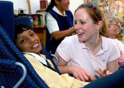 US Navy 071016-N-6524M-002 Hospital Corpsman 2nd Class Rita Rombaoa participates in a community relations project at the Dubai Center for Special Needs photo