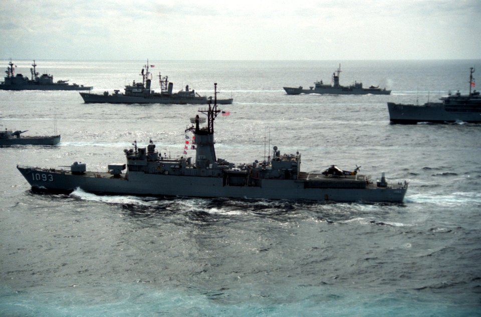 USS Capodanno (FF-1093) with other ships in 1988