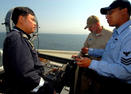 US Navy 071022-N-0841E-064 Sailors assigned to guided-missile frigate USS Carr (FFG 52) took part in a crew exchange visit with the Republic of Singapore landing ship tank RSS Persistence (LST 209)