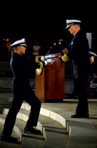 US Navy 071023-N-5319A-025 Members of the Navy Ceremonial Guard deliver the folded Medal of Honor Flag to Chief of Naval Operations (CNO) Adm. Gary Roughead to be presented to Daniel and Maureen Murphy, the parents of Navy SEAL photo