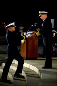US Navy 071023-N-5319A-025 Members of the Navy Ceremonial Guard deliver the folded Medal of Honor Flag to Chief of Naval Operations (CNO) Adm. Gary Roughead to be presented to Daniel and Maureen Murphy, the parents of Navy SEAL