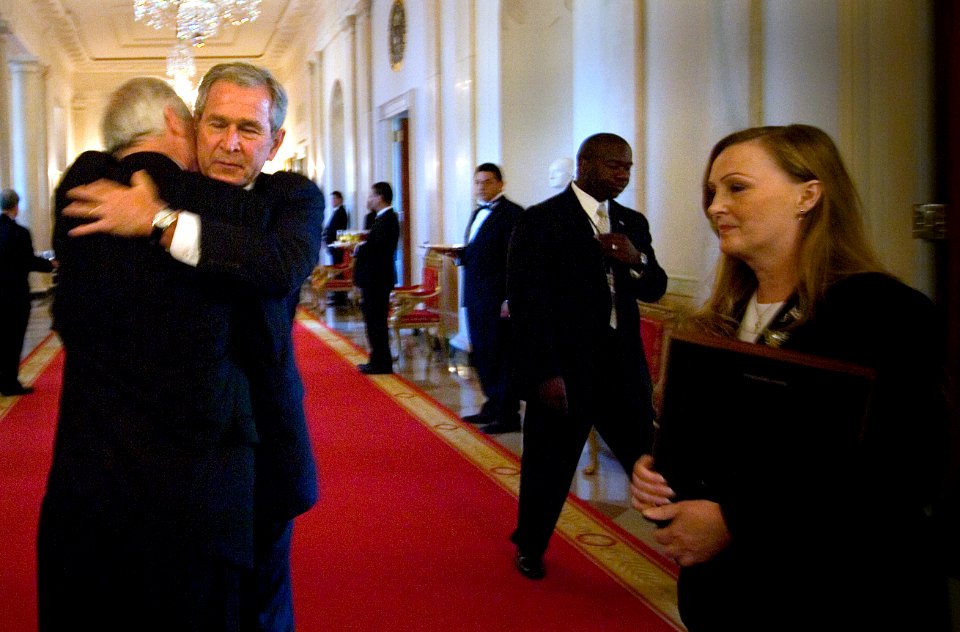 US Navy 071022-N-5319A-001 President George W. Bush embraces Daniel Murphy, father of Navy SEAL Lt. Michael Murphy, prior to the Medal of Honor ceremony at the White House